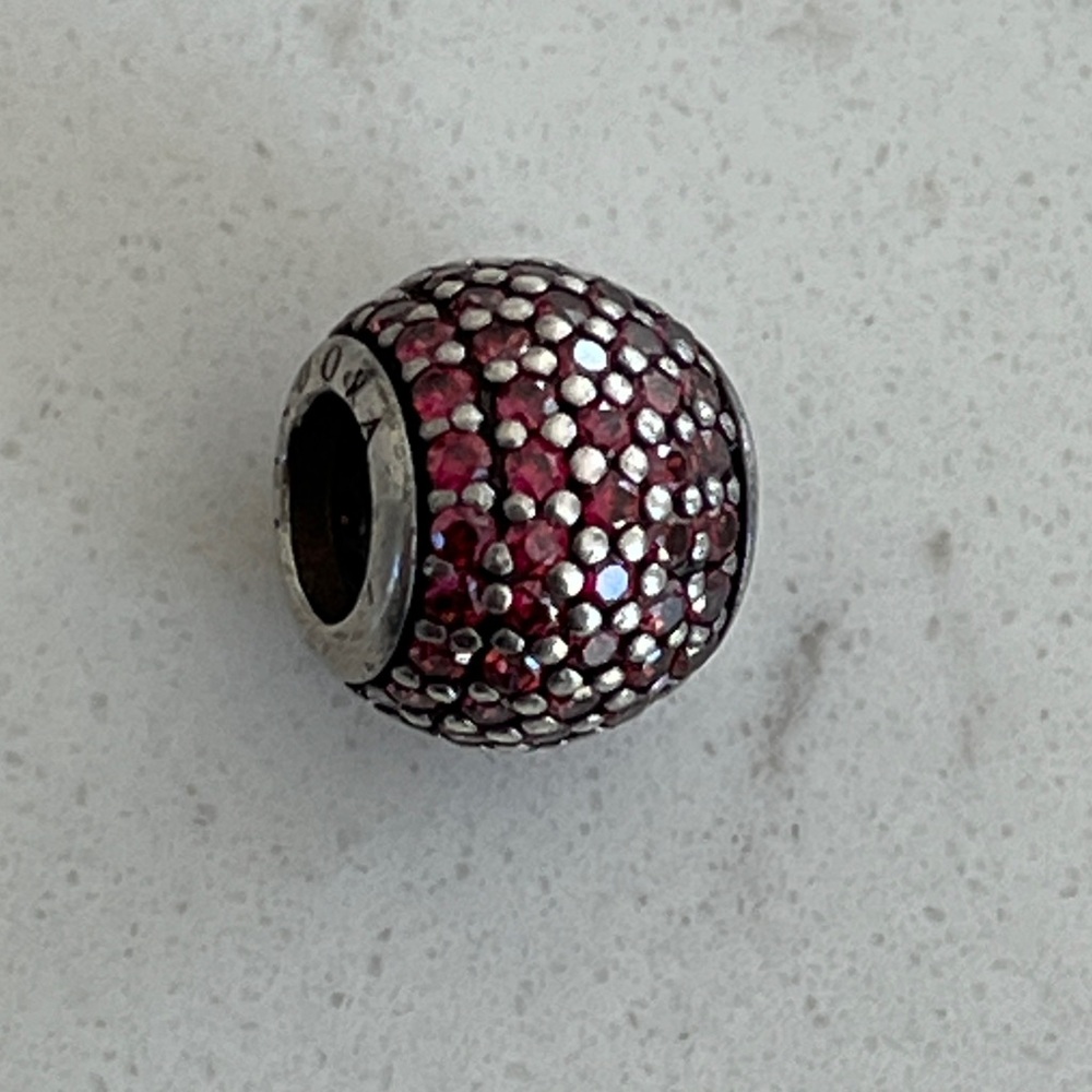 PANDORA Retired ESSENCE
Sterling Silver PASSION Charm with Red Zirconia